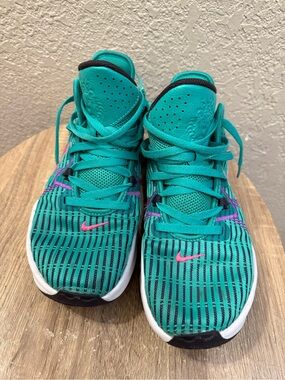 Nike Women’s Teal Athletic Sneakers with Pink Swoosh